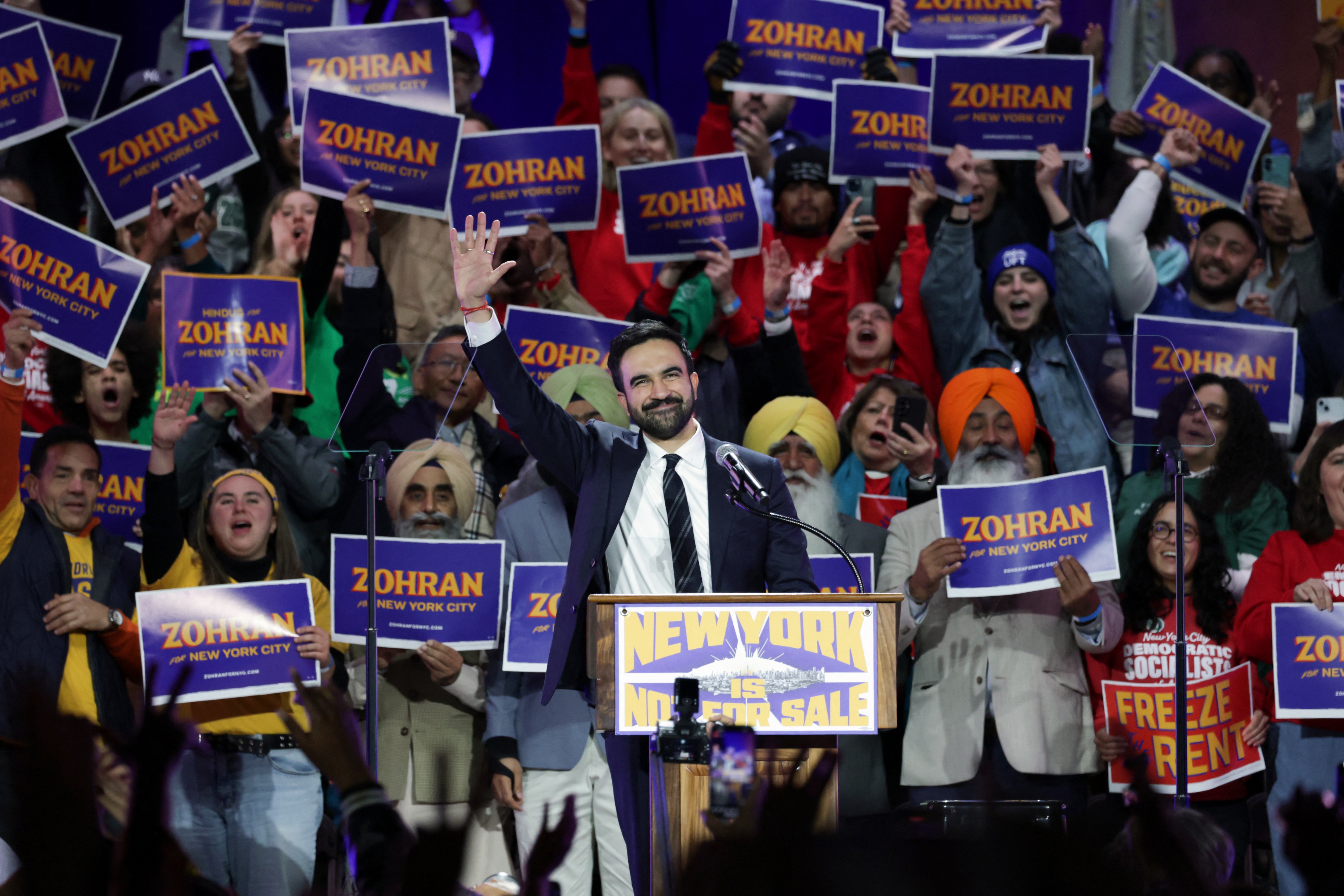 New York City mayoral candidate Zohran Mamdani waves during a campaign rally at Forest Hills Stadium in New York City.